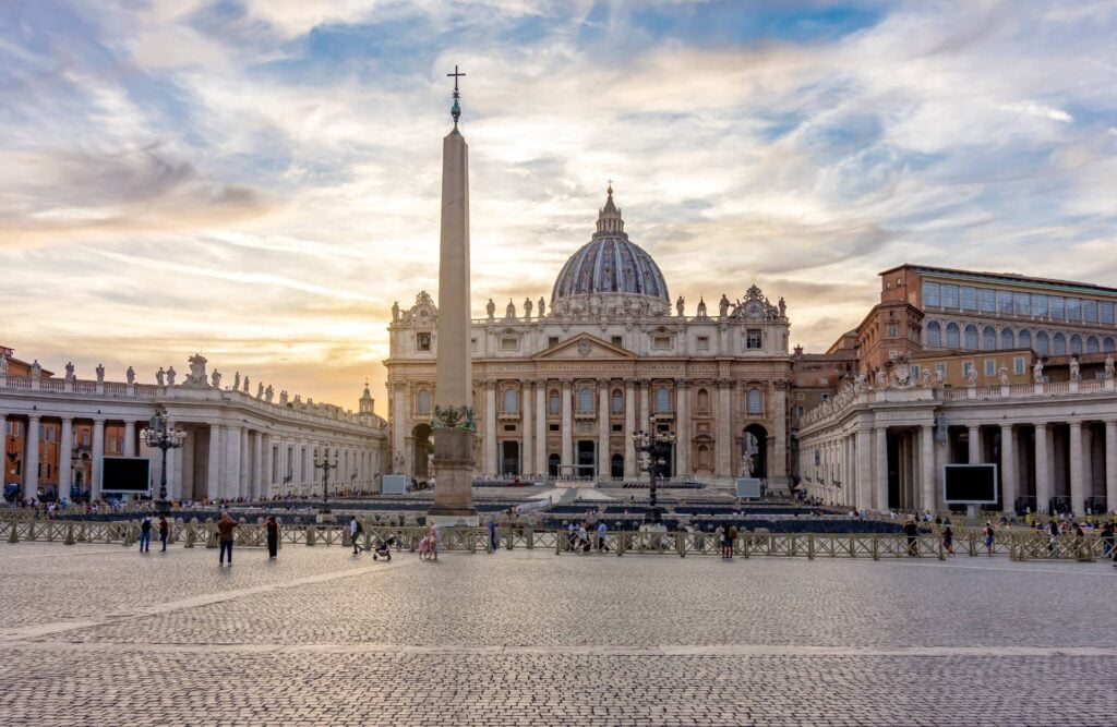 St. Peter's basilica on St. Peter's square in Vatican at sunset, center of Rome, Italy