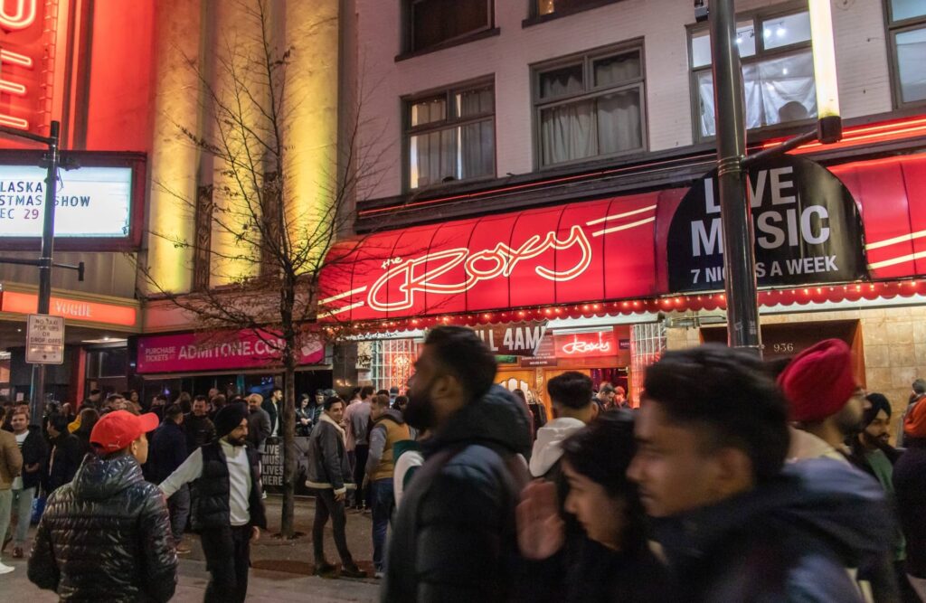 Large crowds of people are drinking in nightclubs in Vancouver, Canada.